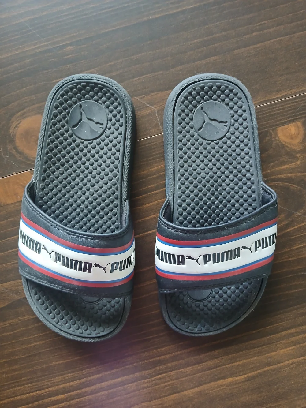 Puma Black Slide Sandal with Red, White & Blue Stripe